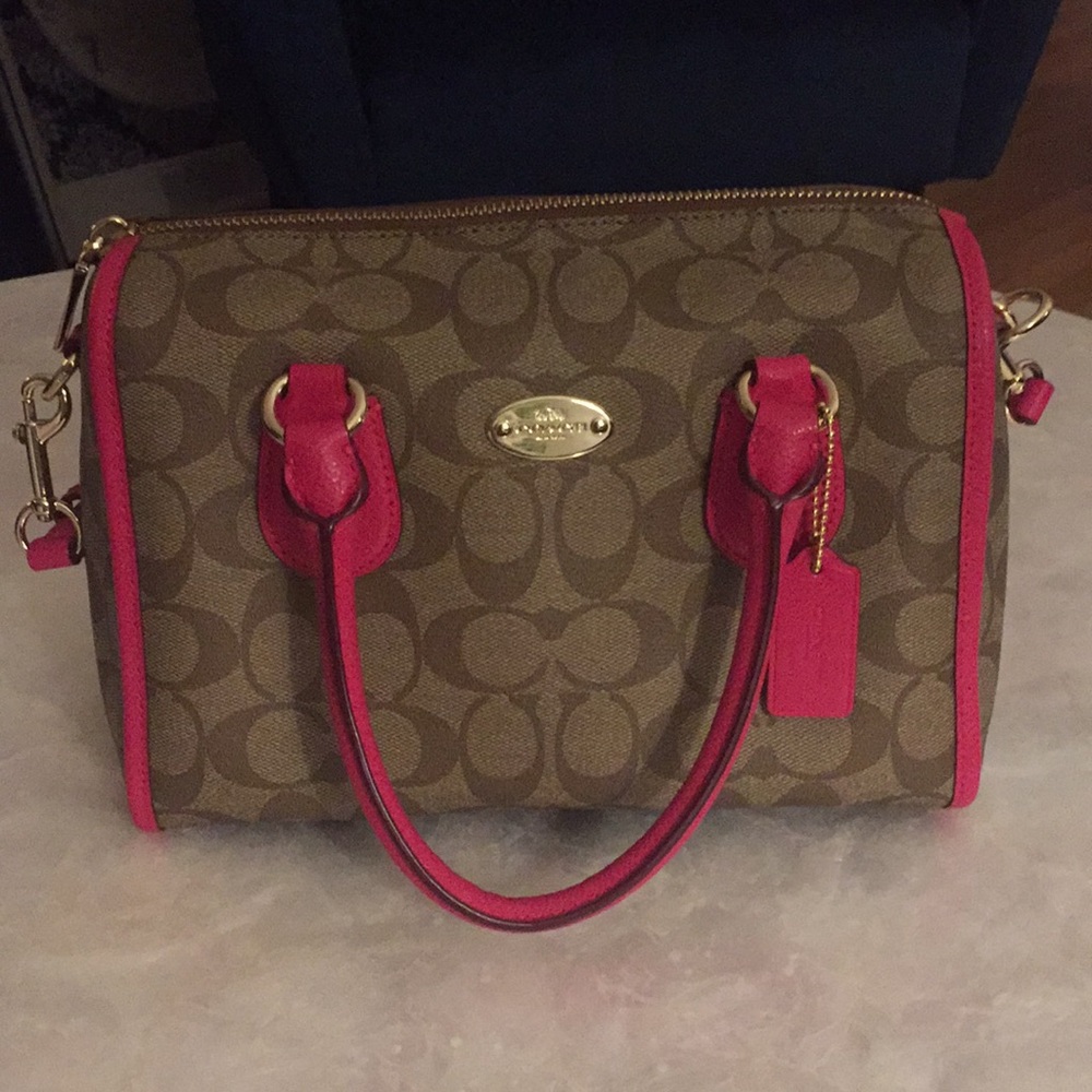 Pink and brown Coach shoulder bag